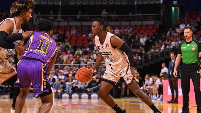 Shannon Scott dribbles the ball up the court during the round three NBL match between Sydney Kings and Cairns Taipans at Qudos Bank Arena, on October 14, 2022, in Sydney, Australia. (Photo by Nathan Hopkins/Getty Images)