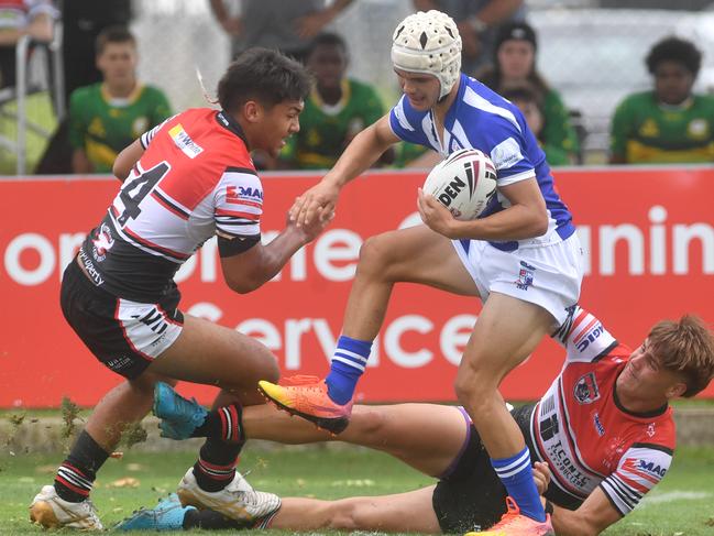 Kirwan High against Ignatius Park College in the Northern Schoolboys Under-18s trials at Brothers Rugby League Club in Townsville. Lincoln Baker tackled by Taakoi Benioni (L) and Heath Bethel (R). Picture: Evan Morgan