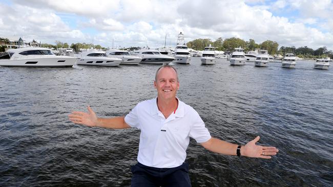 Rodney Longhurst with some of the Riviera range of luxury vessels. Photo by Richard Gosling / RCG Images