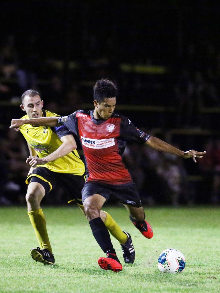 Lions' Seamus Fowler kicks the ball down the pitch in the FNQ Premier League men's match between the Edge Hill Tigers and the Leichhardt Lions, held at Tiger Park, Maunda. Picture: Brendan Radke