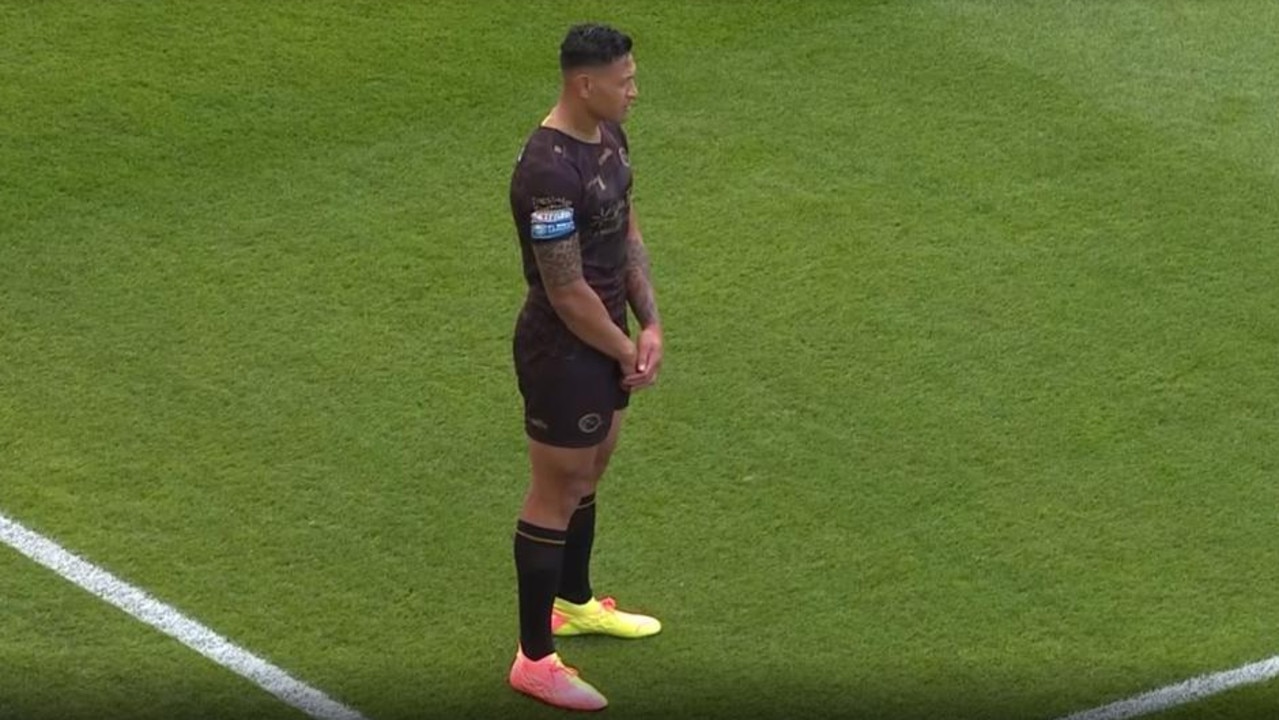 Israel Folau stands up during the moment of reflection