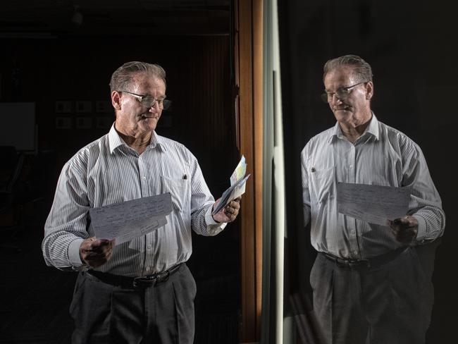 Clarence Valley Council mayor Jim Simmons looks at letters written by schoolchildren in a small town in Western Australia they wrote in condolence over the Christchurch terrorist attack.