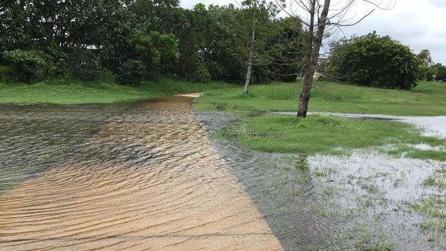 Water inundation over the walkway between Iluka Court and Reef Parade. Picture: Diane Vella