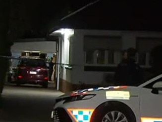 Police outside a Clayfield home where a man was shot overnight. Picture: 7 News