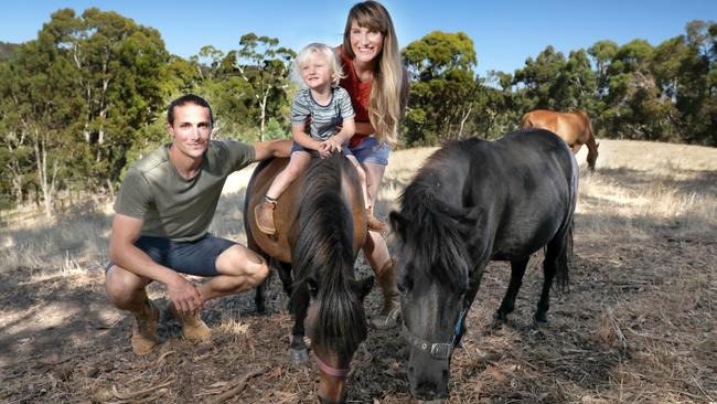 Adelaide United defender Michael Marrone with wife Melody and son Micah, two, on their Adelaide Hills property. Picture: Dean Martin