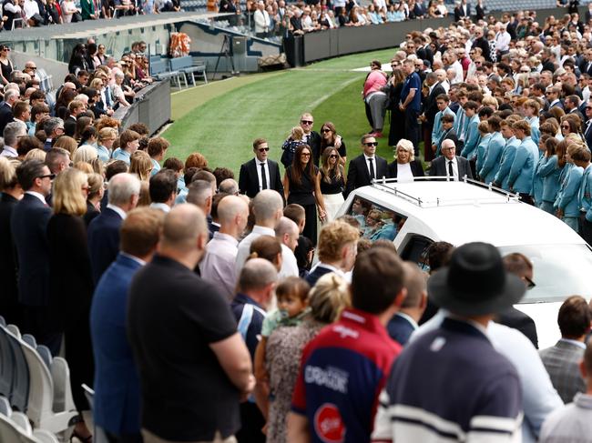 GEELONG, AUSTRALIA - FEBRUARY 14: The Selwood family are seen as the hearse leaves the arena during Troy Selwood's Funeral Service at GMHBA Stadium on February 14, 2025 in Geelong, Australia. (Photo by Michael Willson/AFL Photos via Getty Images)