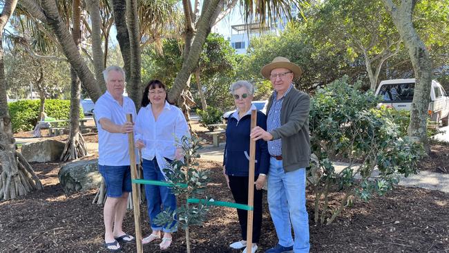 John, Lynelle, Pat, and Catherine McGrath with 'The Lucy Tree' at Happy Valley, Caloundra.