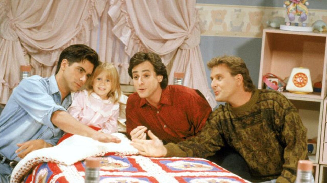 Stamos, Mary-Kate Ashley Olsen, Bob Saget and Dave Coulier. Picture: Warner Bros./Courtesy: Everett Collection