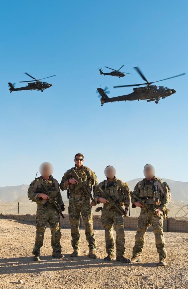 A never-before-seen photo of Person 11, Ben Roberts-Smith, Person 56 and Person 4 in October 2012.