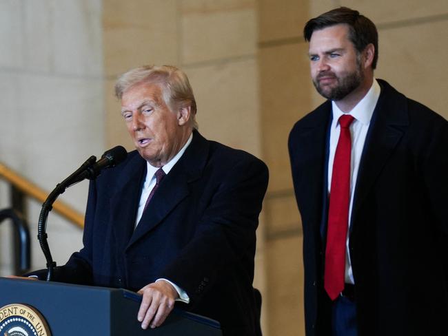 US President Donald Trump speaks as Vice President J.D. Vance looks on in Emancipation Hall. Picture: AFP