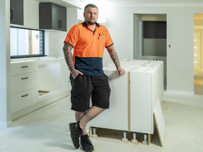 Dale Liston at his incomplete Logan Reserve home. Picture: Richard Walker