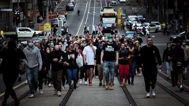 Protesters walk through the streets of the city last weekend. Picture: Darrian Traynor/Getty Images