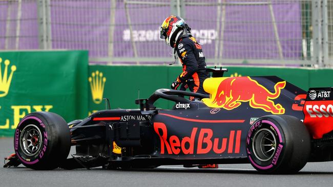 Daniel Ricciardo hops out of his car after crashing into Max Verstappen in the Azerbaijan GP.
