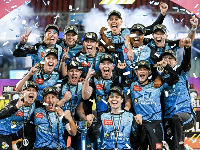 ADELAIDE, AUSTRALIA - DECEMBER 02:The Strikers celebrate on the podium  after winning  the WBBL Final match between Adelaide Strikers and Brisbane Heat at Adelaide Oval, on December 02, 2023, in Adelaide, Australia. (Photo by Mark Brake - CA/Cricket Australia via Getty Images)