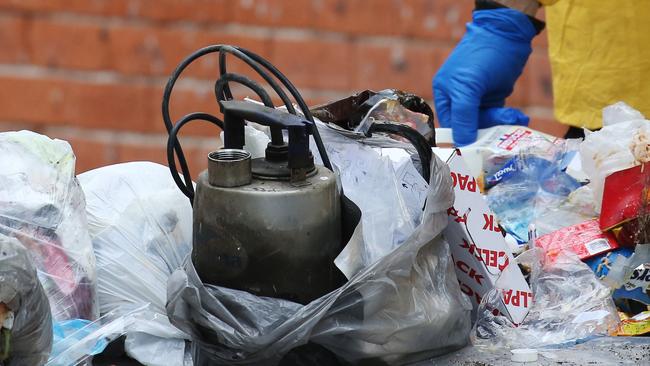 A host of items have been seized from the Lakemba house as part of a string of counter-terror raids. Picture: Toby Zerna