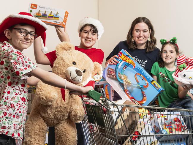 Helping to pack Salvation Army Christmas hampers are (from left) Micah Robinson, Zach Reid, Natalie Versace and Naomi Robinson, Wednesday, December 11, 2024. Picture: Kevin Farmer