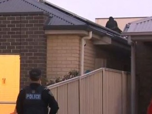 A man climbed on to a roof in Greenacres to escape police. Picture: Nine News Adelaide