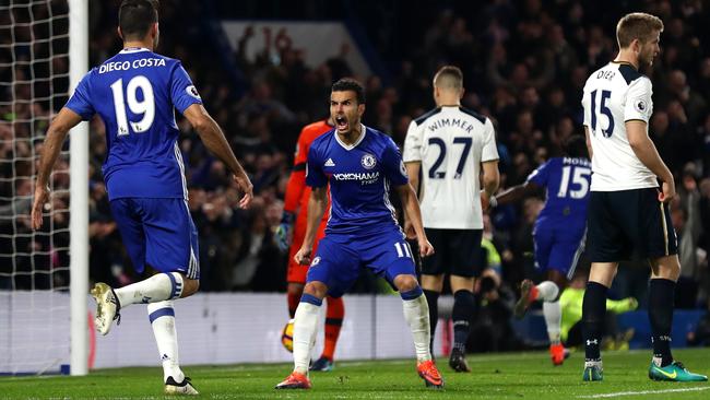 Pedro (C) of Chelsea celebrates scoring.