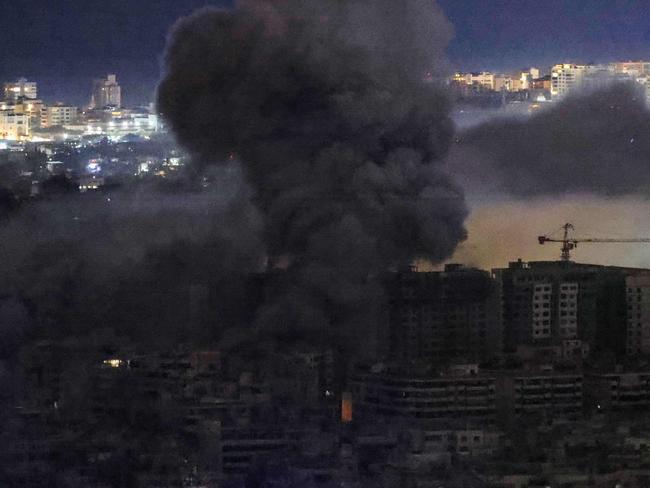 Smoke rises from the site of an Israeli airstrike in the southern suburbs of Beirut on November 21. Picture: AFP