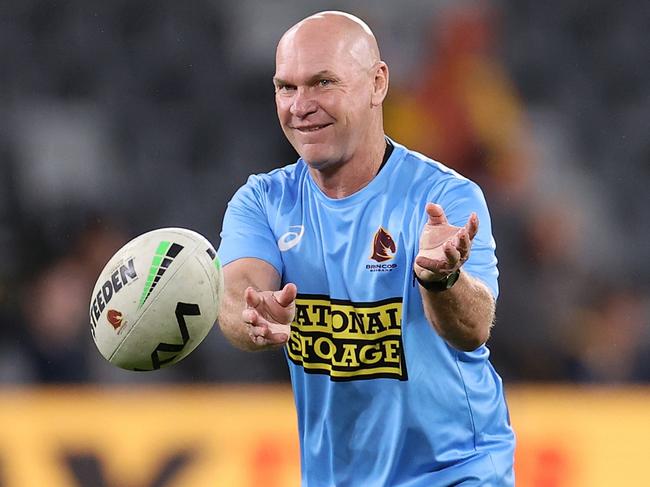 SYDNEY, AUSTRALIA - JULY 21: Allan Langer passes the ball to Adam Reynolds of the Broncos during warm up ahead of the round 19 NRL match between the Parramatta Eels and the Brisbane Broncos at CommBank Stadium on July 21, 2022, in Sydney, Australia. (Photo by Cameron Spencer/Getty Images)