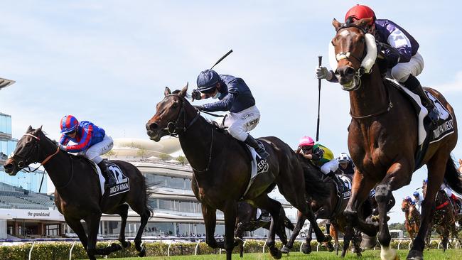 Twilight Payment (right), ridden by Jye McNeil, winning last year’s Melbourne Cup at Flemington. Picture: Racing Photos via Getty Images