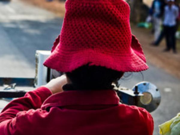 Workers travel home from a garment factory in Phnom Penh. Picture: Samer Muscati/Human Rights Watch.