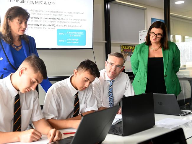 NSW Premier Dominic Perrottet and Minister for Education and Early Learning Sarah Mitchell with Wendy Lindsay, Member for East Hill, and students of De La Salle College in Revesby Heights. Picture: POOL/ NCA NewsWire / Jeremy Piper