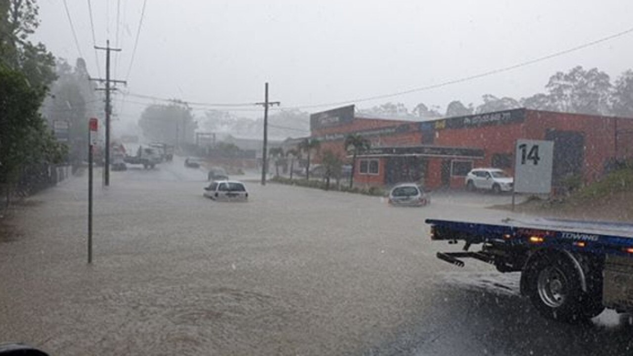 A car underwater at Molendinar. Photo: Sylvia Dc