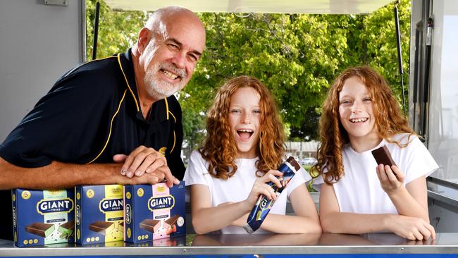 Golden North’s Trevor Pomery and Pt Augusta twins Eve and Dayna Grantham 10yrs old with the updated Giant Twins ice cream. Picture: Tricia Watkinson