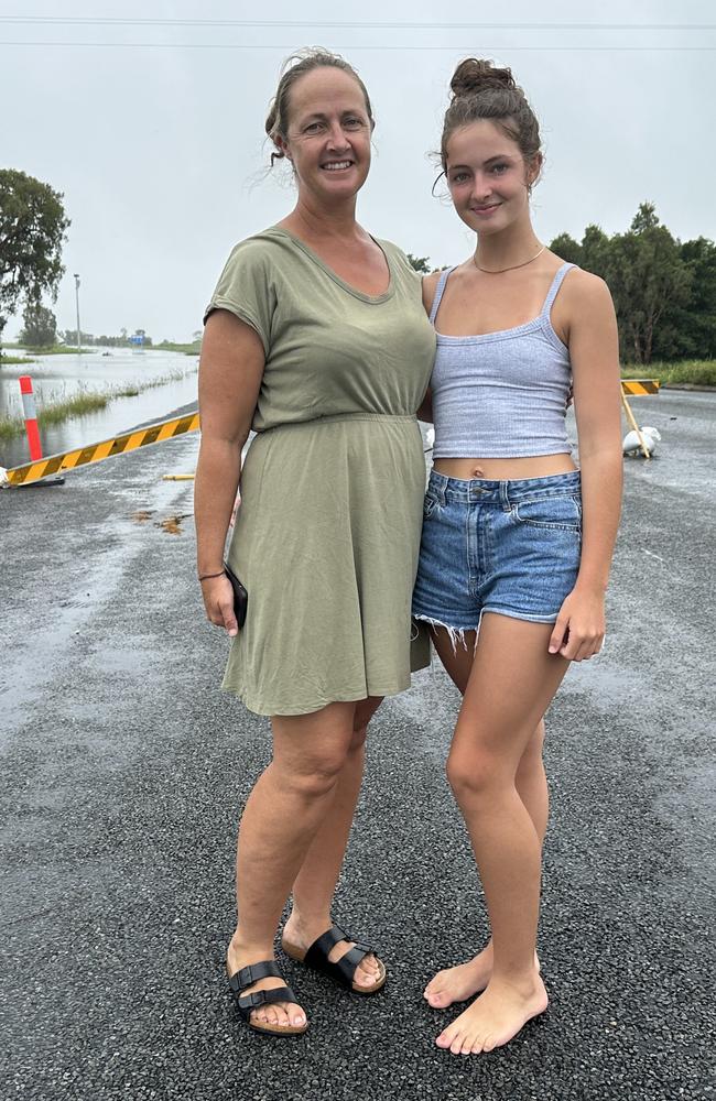 Proserpine mum Phillipa Leabeater and daughter Dash Turner, 13, are waiting for the floodwaters to subside over the Bruce Highway at Lethebrook, just south of Proserpine. They have been waiting since Sunday, January 15, 2023. Picture: Heidi Petith