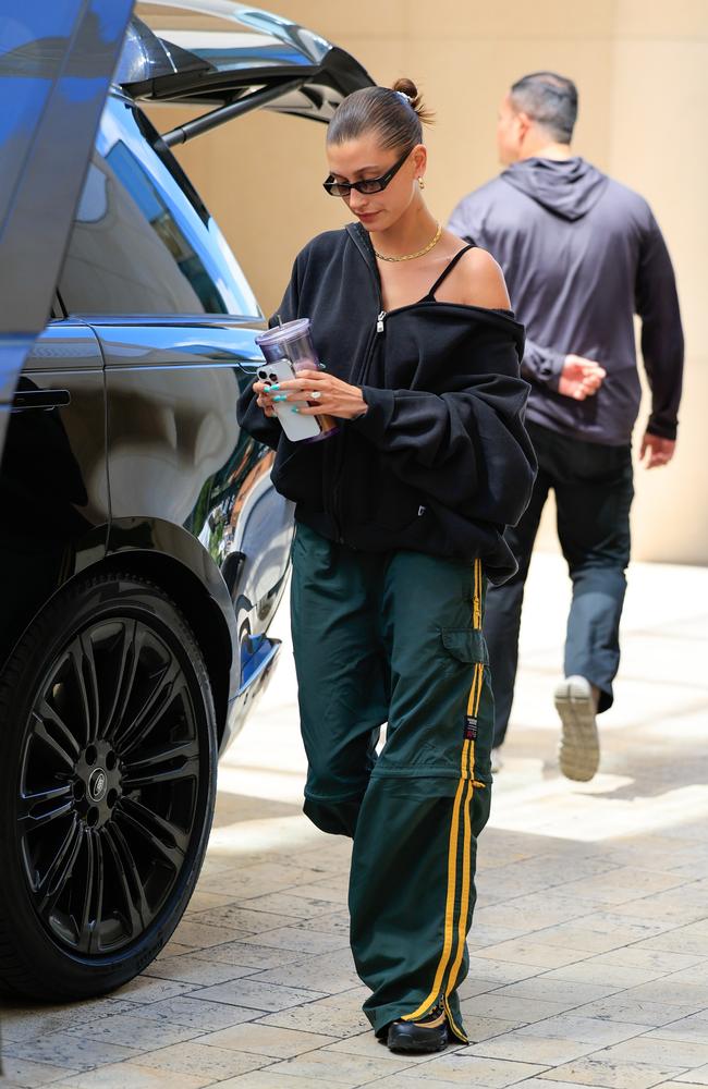 Melissa Leong has made the case for tracksuit pants as a style statement, as seen on Hailey Bieber (above). Picture: Rachpoot/Bauer-Griffin/GC Images