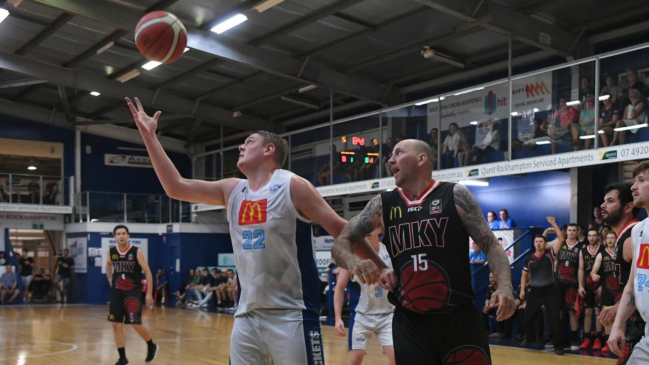 BASKETBALL ConocoPhillips CQ Cup Rd 1: Rockhampton Rockets' Trevor Corrigan and Mackay Meteors' Brad Rasmussen