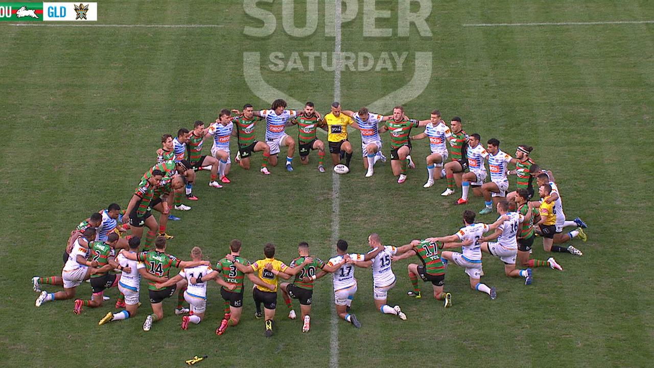 The Rabbitohs and Titans take a knee.