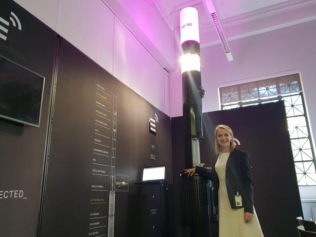 Amanda Cooper with an example of the Brisbane Smart Pole. 