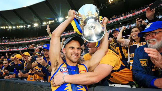 West Coast Eagles’ Dom Sheed lifts the cup — one of Justin Langer’s fondest MCG memories. Picture: Mark Stewart