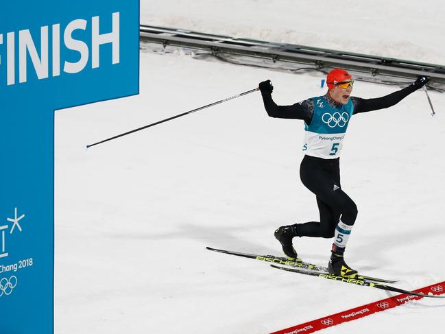 Germany’s Eric Frenzel crosses the finish line to win gold in the nordic combined men’s individual normal hill NH/10km cross country final at the Alpensia cross country centre during the Pyeongchang 2018 Winter Olympic Games on February 14 , 2018 in Pyeongchang. Picture: AFP