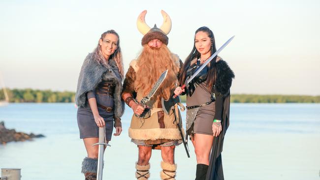 Lanz Treagus, Ray Jarrett and Krystle Jencik at the annual Dinah Beach Yacht Club Viking Funeral. Picture: Glenn Campbell