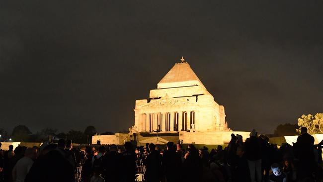 Crowds gather during the Dawn Service at the Shrine of Remembrance in Melbourne. Picture: AAP.