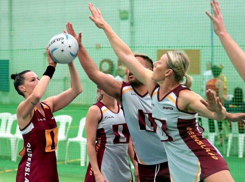 CLOSE DEFENCE: Toowoomba's Michelle Lynch (right) defends a shot on goal. The indoor netball defender will head to South Africa later this year to represent Australia at the Aged Indoor Netball World Series. Picture: PowerShots Photography