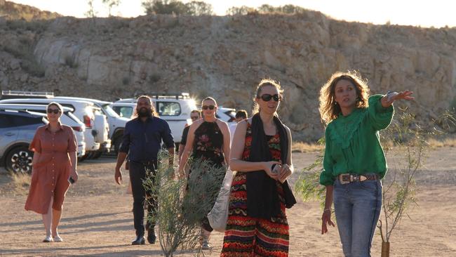 Punters, such as Fannie Bay MLA Laurie Zio in the background, arrives at the 2024 NT Performing Arts Awards were crowned at the Old Quarry. Picture: Gera Kazakov