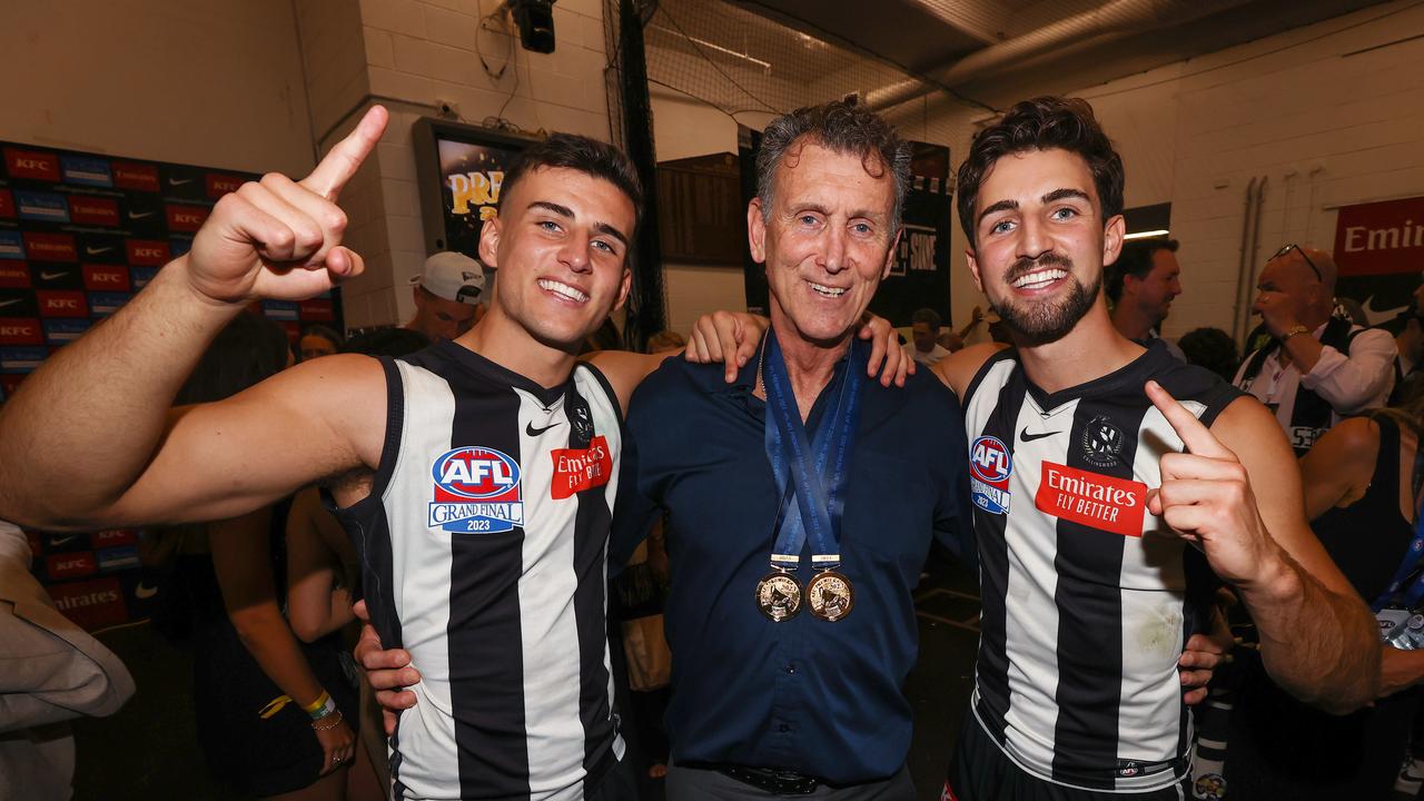 The brothers with dad Peter in the rooms. Picture: Michael Klein