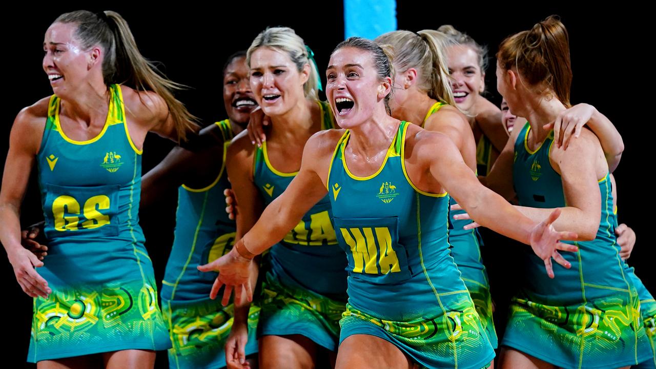 Australia's Liz Watson celebrates with her teammates after winning the Netball Gold Medal match against Jamaica at the Commonwealth Games.