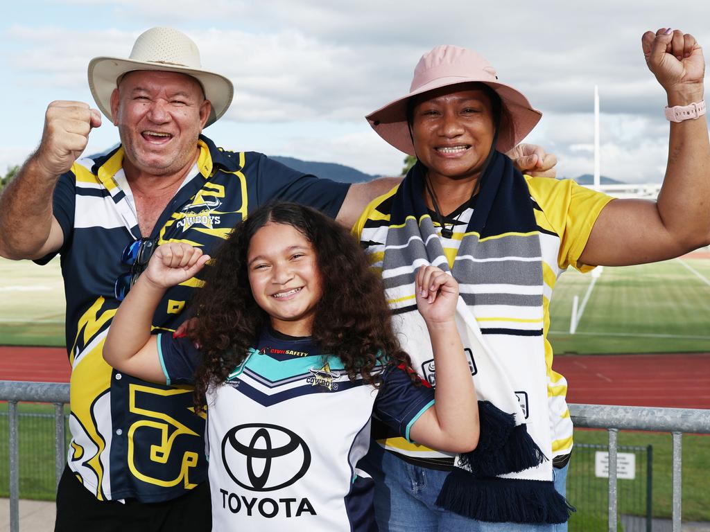 Tau Matapere, Manu Matapere, 9, and Pala Matapere were at Barlow Park to cheer on the Cowboys in the NRL preseason match against the Dolphins. Picture: Brendan Radke