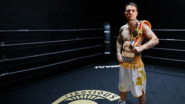 Boxing champ George Kambosos in his gym.