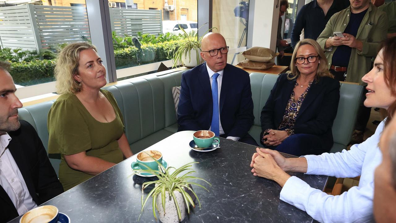 Peter Dutton met Ian Lynch and Sara Foster to discuss domestic violence on the campaign trail at Gosford South. Pictures Adam Head / NewsWire