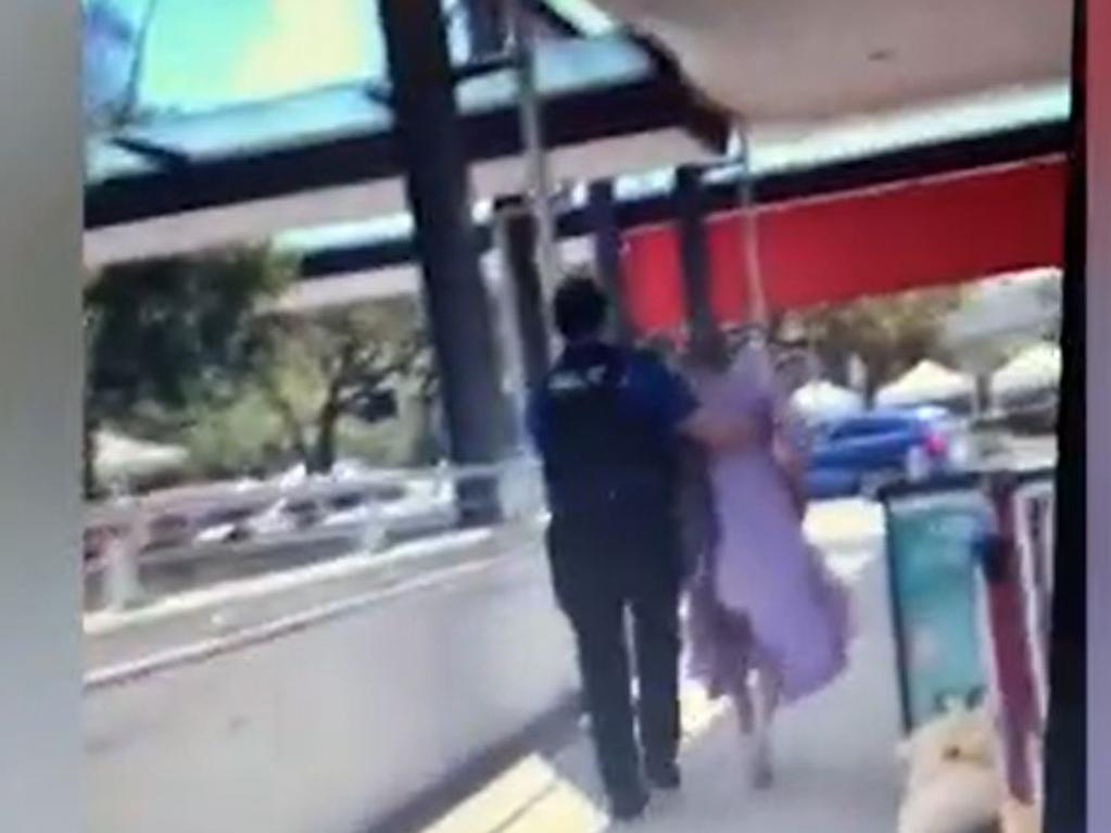 A screengrab of a man, believed to have mental health issues, being frog marched out of one of Brisbane's busiest hospitals. Picture: Supplied/NCA