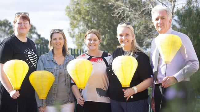 From left, Alys Holz, Suzanne Lord, Ann Cabrera, Kim Roberts and Nick Ciraldo prepare for the Wattle Grove Light the Night event. Picture: Melvyn Knipe