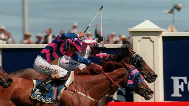 Might and Power (Jim Cassidy) stretches out to defeat Doriemus (Greg Hall) by a nose to win the 1997 Melbourne Cup.