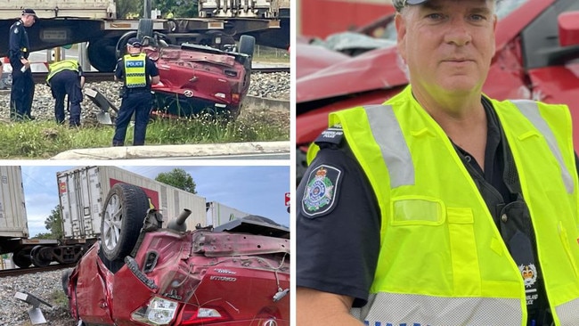 Elderly woman seriously injured in car, train crash