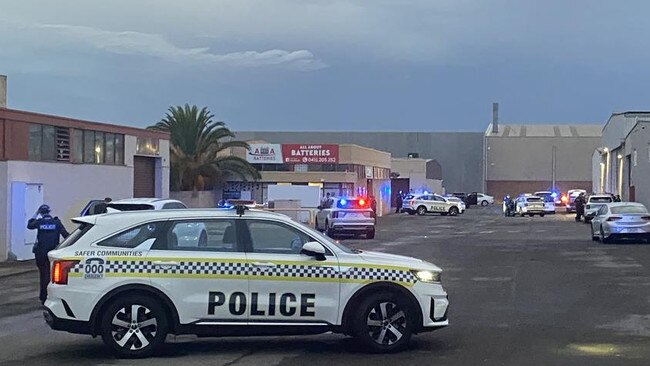 Police at the scene of the shooting at Royal Park. Picture: Todd Lewis